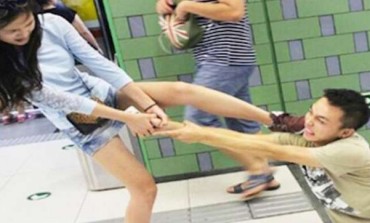 LOL! Mobile Madness: Girl Drags Boyfriend Off Train For Texting