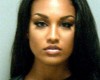 We now have a female suspect whose mugshot is causing a storm online