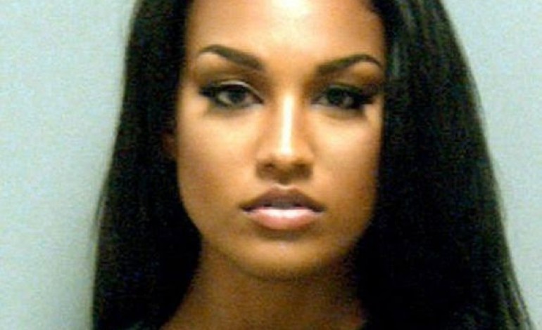 We now have a female suspect whose mugshot is causing a storm online