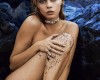 Model Cara Delevingne poses completely n*de with padlock & chain