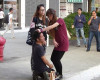 Photos: Furious Girlfriend Makes Cheating Boyfriend Kneel In The Street While She Slaps, Humiliates Him