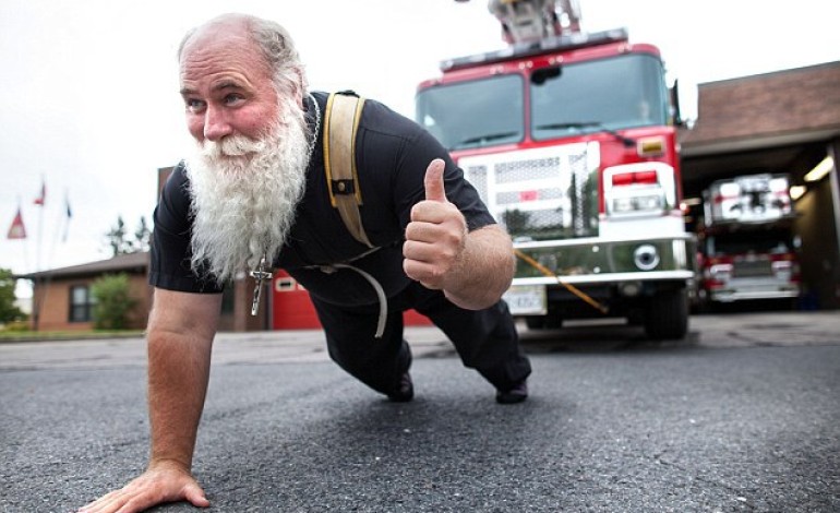 Meet World’s Strongest Priest Who Pulls Planes, Ships and Trains