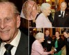 Prince Philip is seen with a hearing aid for the first time as he and the Queen meet hero Victoria Cross veterans in London