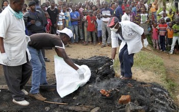 Mob stone to death suspected ISIS member then burn his corpse and EAT him as revenge for series of attacks in Congo