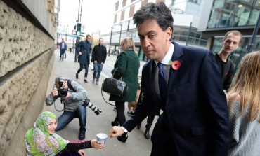 Lol! Ed Miliband dropped just 2p into a beggar's cup in Manchester