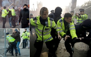 Police clash with student protestors as thousands march on Parliament Square and Tory party headquarters in anger over tuition fees and graduate debt