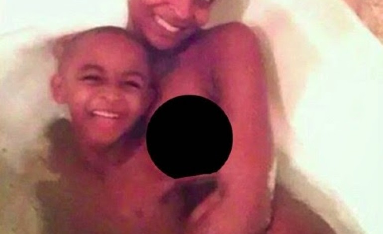 Not Appropriate: See the way mother post in the shawer nu.de with son ,’Photo’