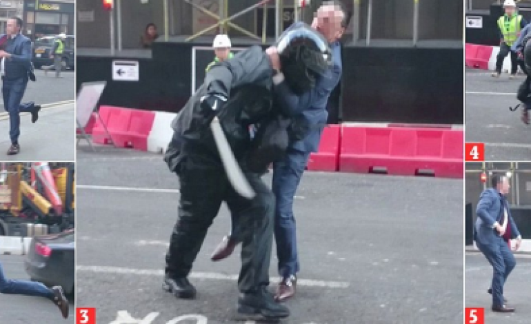 Pics: Incredible moment man in suit takes on thief with a machete on London street