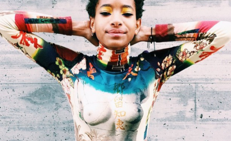 Is 13yr old Willow Smith topless in this pic, or what’s going on here?