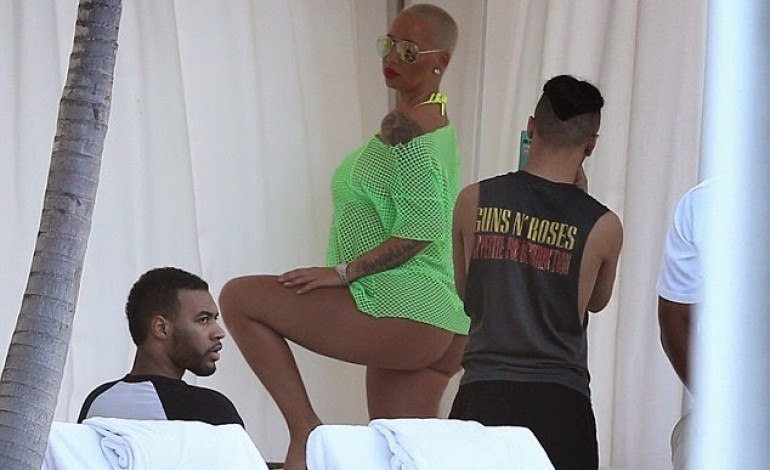 Wow! Amber Rose goes to pless