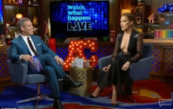 Photos: JLo displays cleavage in plunging dress during interview