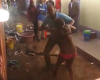 Photos: Neighbours stand and watch as man beats his wife almost to death for cheating