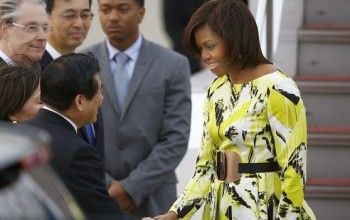 Michelle Obama stuns in floral Kenzo dress as she arrirves Japan