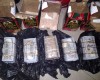 Photos: #NDLEA arrests #SouthAfrican lady with N74m concealed in oats packs