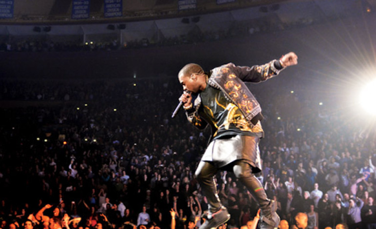 #OMG! #KanyeWest Jumps Into A Lake While Performing [PHOTOS]