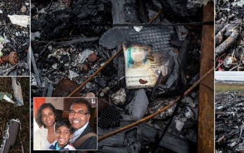 #EXCLUSIVE - Pictured: Haunting images of #MH17 victim's charred passport still lying at crash site alongside other passengers' personal possessions NINE MONTHS after jet was blown from sky