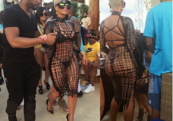 Pics: #AmberRose attends pool party in #Vegas in a see-through outfit
