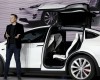 Tesla's Model X electric car spreads falcon wings at US launch