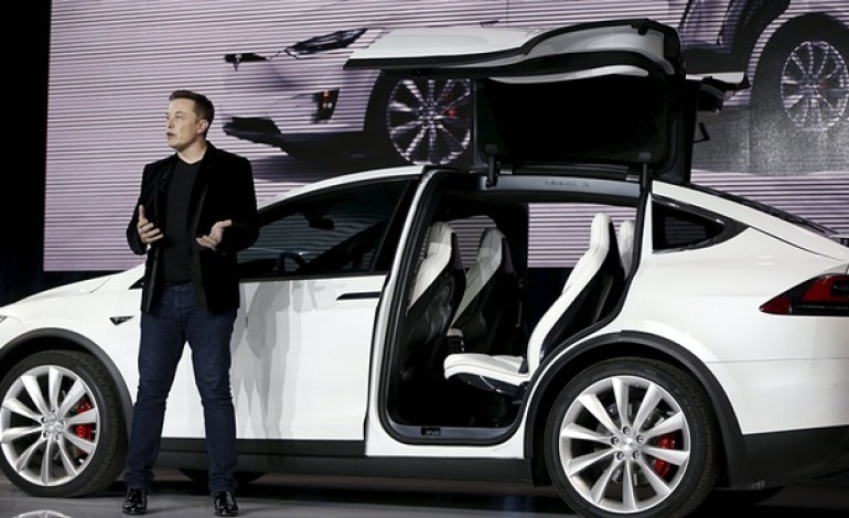 Tesla’s Model X electric car spreads falcon wings at US launch