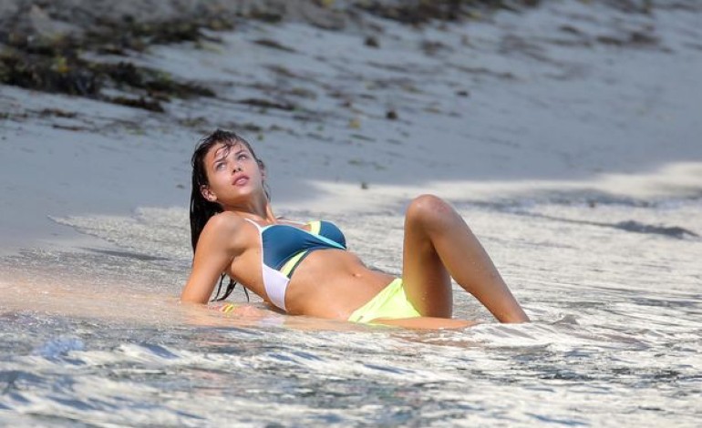 Harry Styles’ girl Georgia Fowler flashes flesh in bikini shoot in Caribbean surf