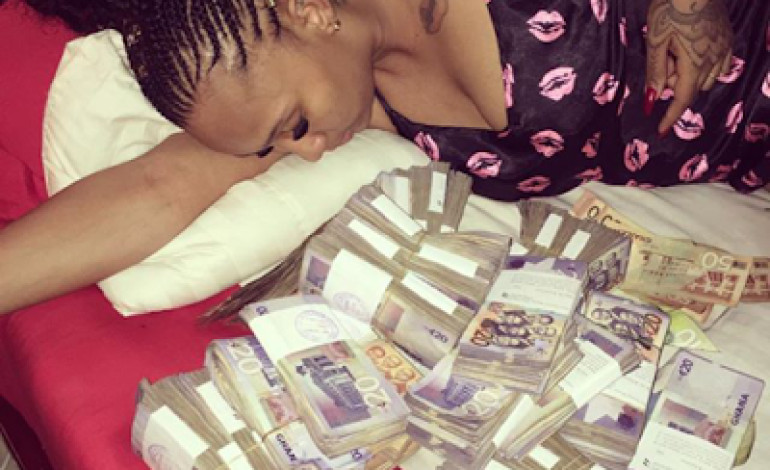 See Actress Princess Pemu Sleeping on Bundles of Money