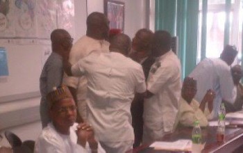 Photos: NFF President Amaju Pinnick & Chris Giwa almost get physical during 'peace' meeting with Sports Minister in Abuja