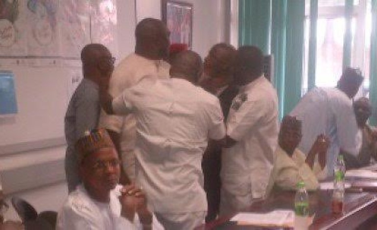Photos: NFF President Amaju Pinnick & Chris Giwa almost get physical during ‘peace’ meeting with Sports Minister in Abuja