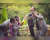 Aww...Check out this wedding photo...groom is proudly showing off his ring