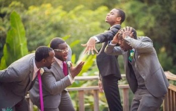 Aww...Check out this wedding photo...groom is proudly showing off his ring