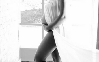 Footballer Uche Kalu's wife, Ada, shares photos from her pregnancy shoot