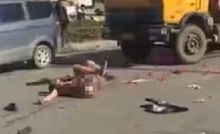 Pics: Man rolls around on the road naked after girlfriend rejects his marriage proposal