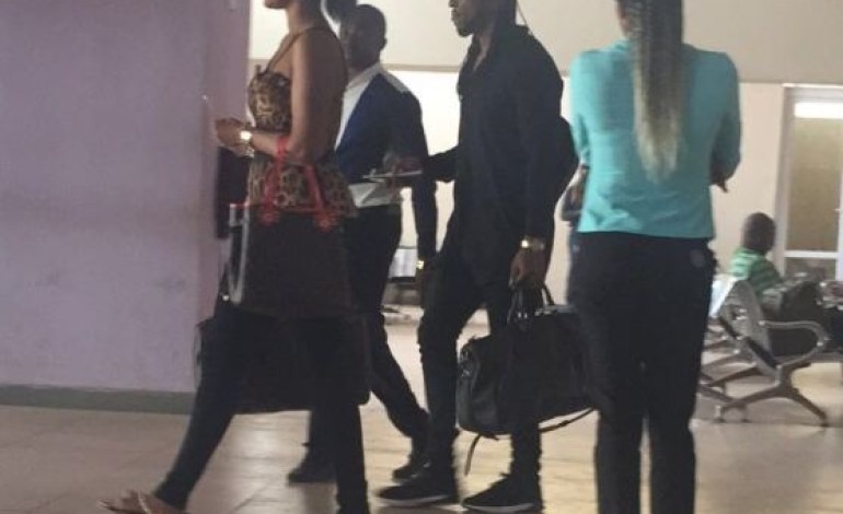 Flavour and babymama Sandra spotted at Enugu airport (photo)