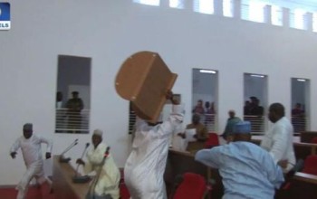 Photo/Video: Nassarawa state lawmakers fight dirty in their chambers over appointment of sole administrators