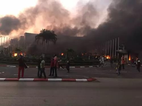 BREAKING: Tension as angry protesters set Senate on fire in Gabon (Photo)