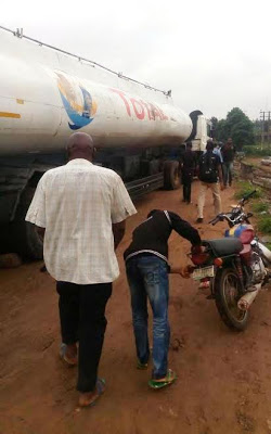 Graphic photos: Petrol tanker crushes two to death in Ikorodu