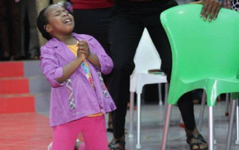 Wow! Little girl pictured down on her knees and in tears as she prays and worships God