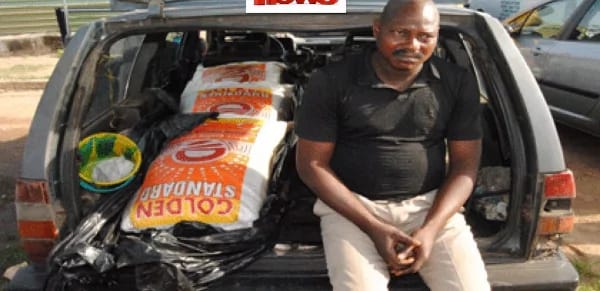 Man arrested with the smuggled bags of rice.