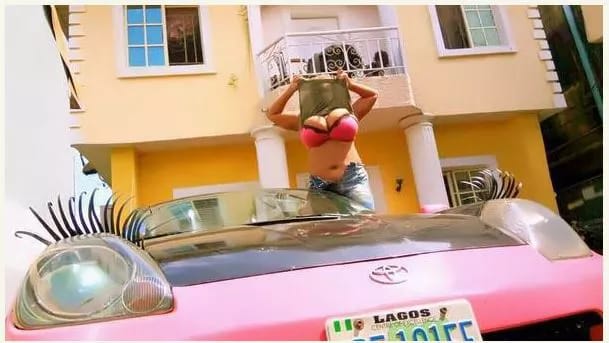 Cossy shows off her car, boobs in new photos