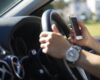 Drivers to be banned from picking up mobile phones